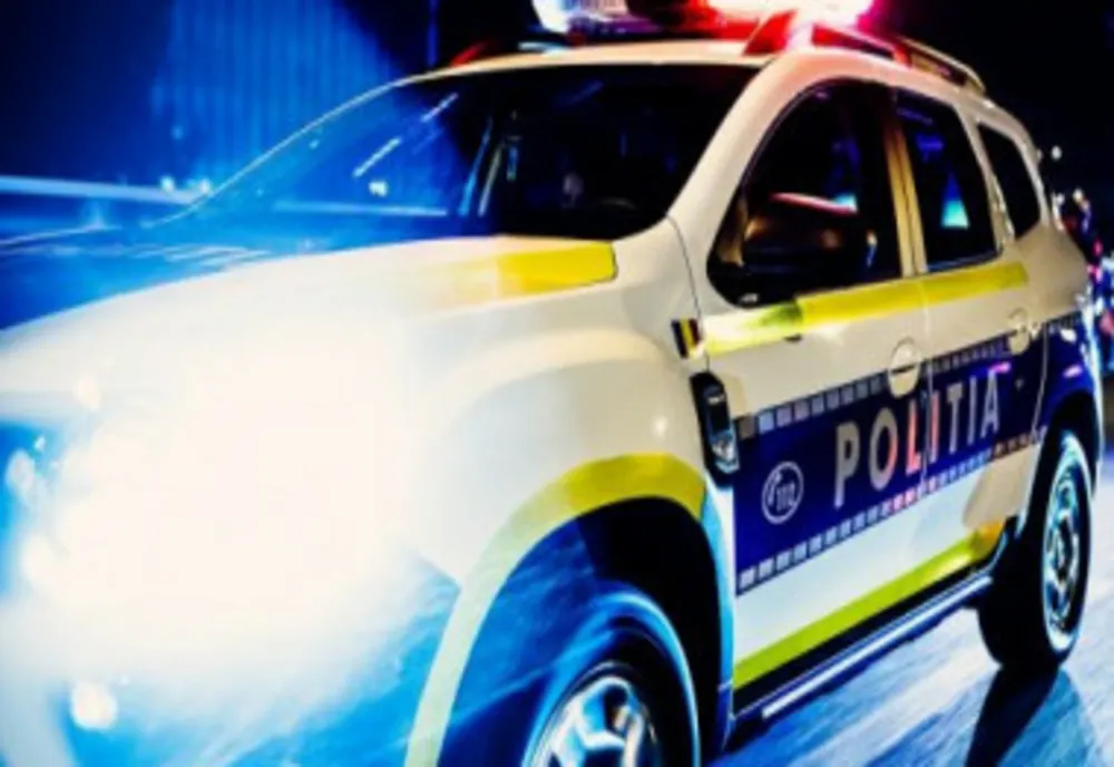 Prins de poliţişti în timp ce alerga cu toporul pe stradă, urmărindu- și iubita