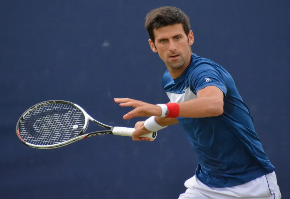Novak Djokovici s-a calificat în sferturi la Australian Open pentru a 14-a oară
