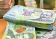 Salariații români lasă aproape 60% din suma bruta la stat. Calculele care arată cât de mult ținem statul în spate